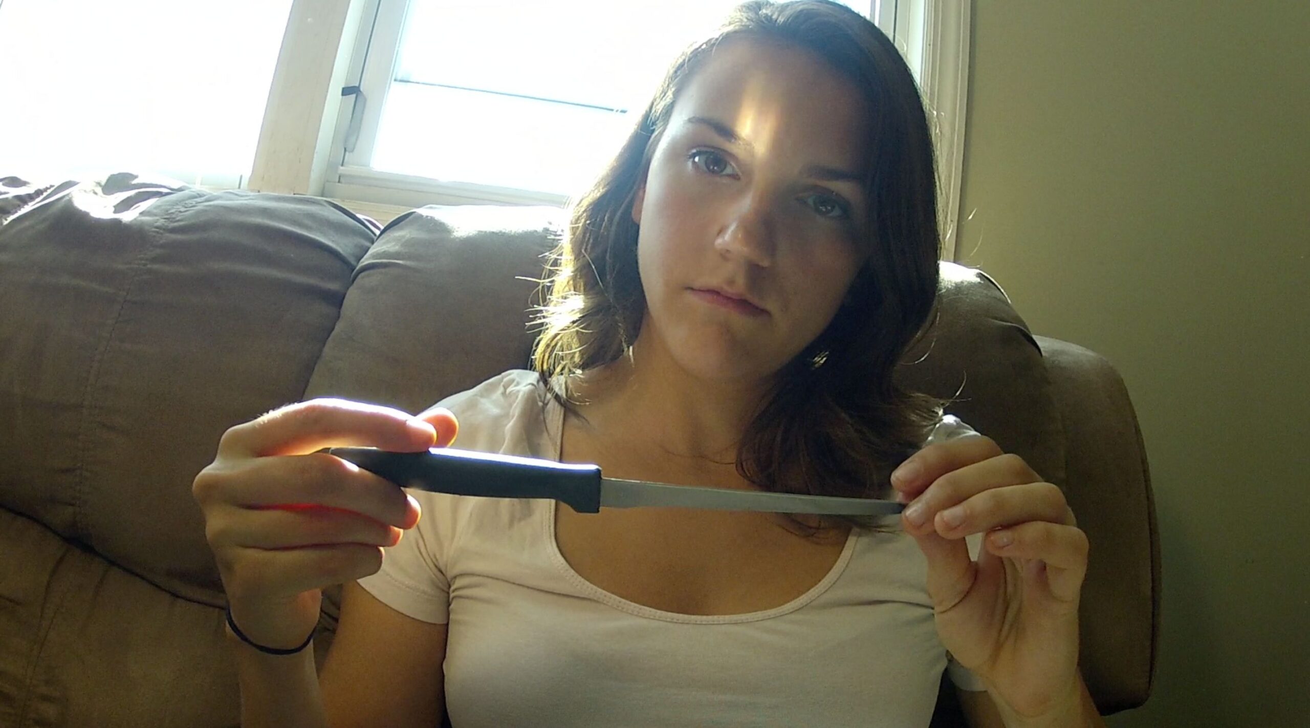 April holds knife in The Death of April