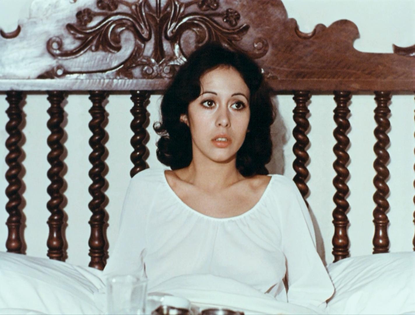 Frightened woman in Dr. Orloff