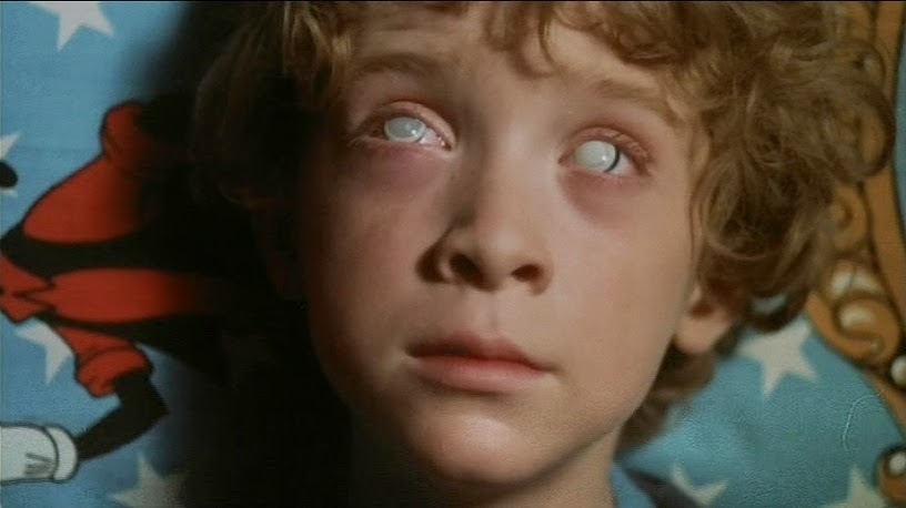 Kid with white eyes in Beyond the Door II