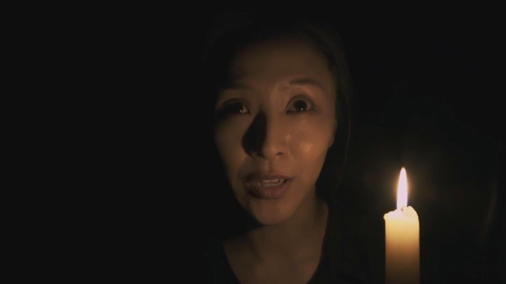 Girl with Candle in The Evil Within