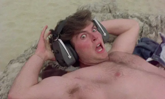 Guy in headphones screams