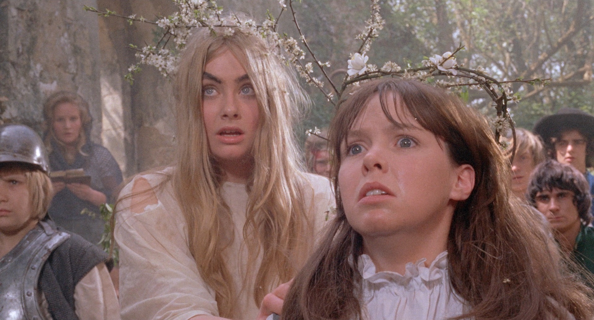 Girls in headdresses look scared in Blood ON Satan's Claw - folk horror