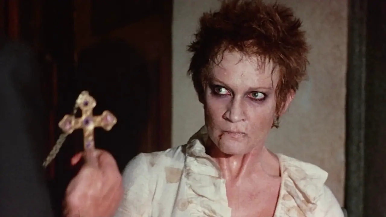 Possessed woman is confronted by cross