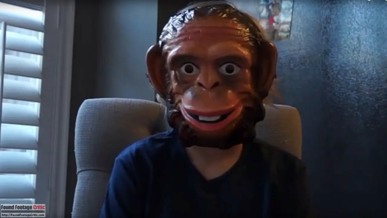 Man in ape mask