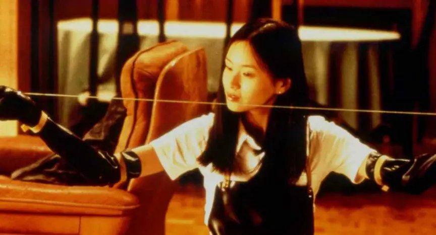 female killers Asami (Eihi Shiina) getting ready to engage in some torture in Takashi Miike's Audition.
