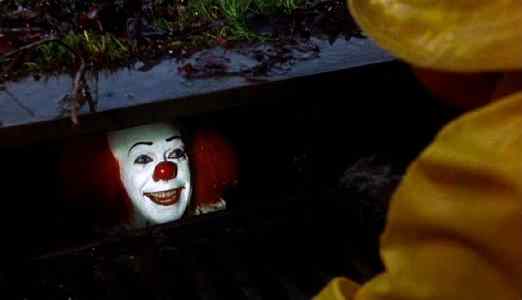 Pennywise from Stephen kinds IT novel hiding within the drains to capture children and feed on their souls.