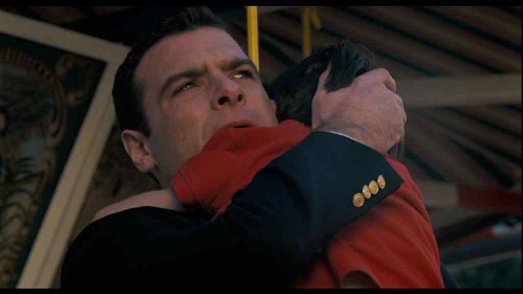Damien gets a hug from his father played by Liev Schreiber in the remade 2006 Omen movie.