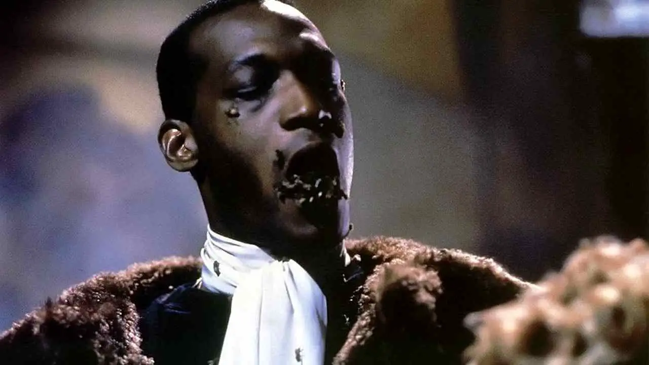 Candyman (Tony Todd) unleashing some bees on a victim in Bernard Rose's 1992 Clive Barker adaptation Candyman.