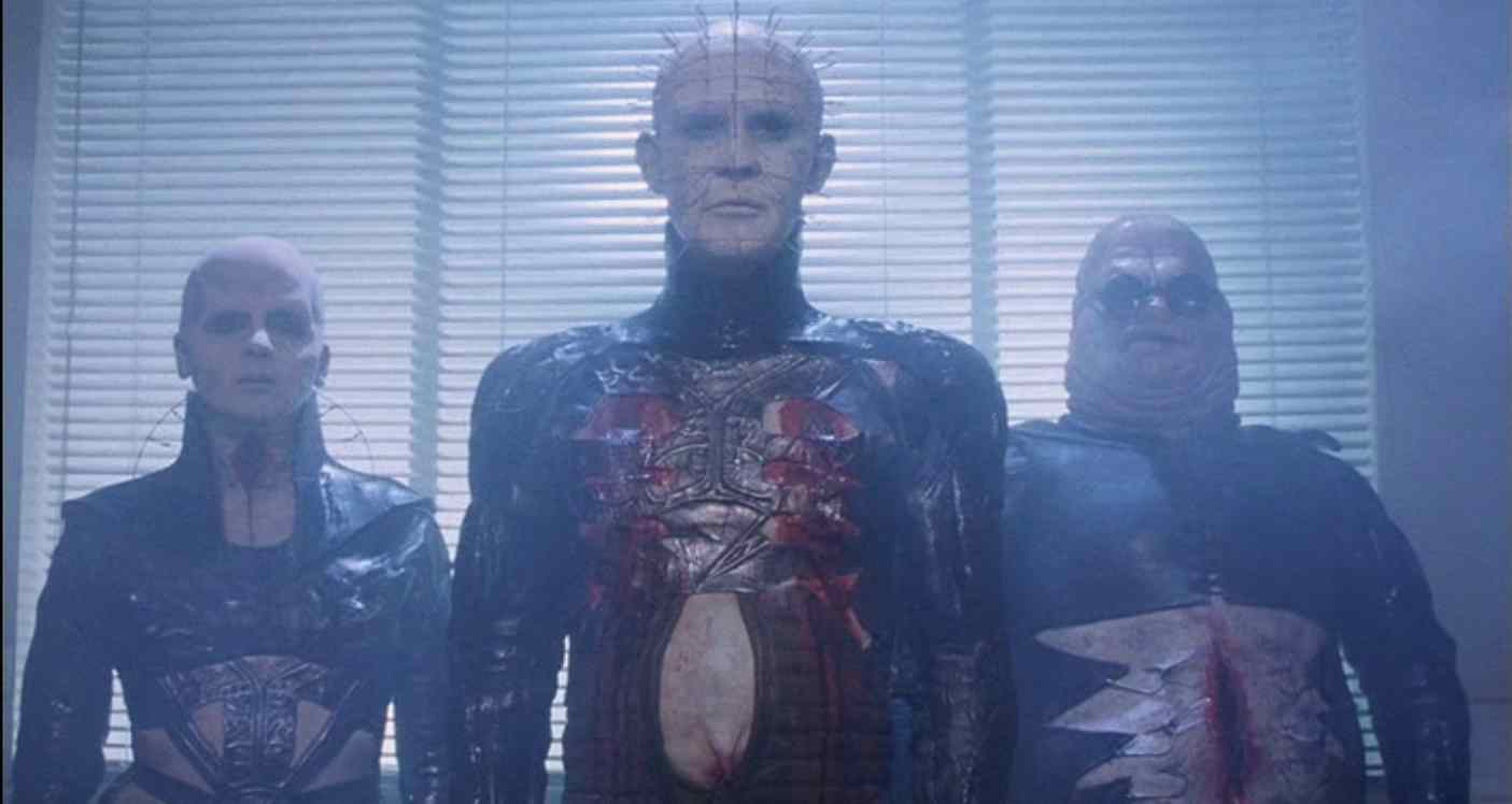 Chatterer, Female Cenobite, and Pinhead (Doug Bradley) in Clive Barker's 1987 Horror film Hellraiser.