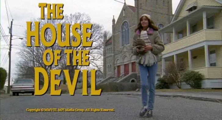 Samantha (Jocelin Donahue) at the title screen of the Ti West supernatural horror film The House of the Devil.