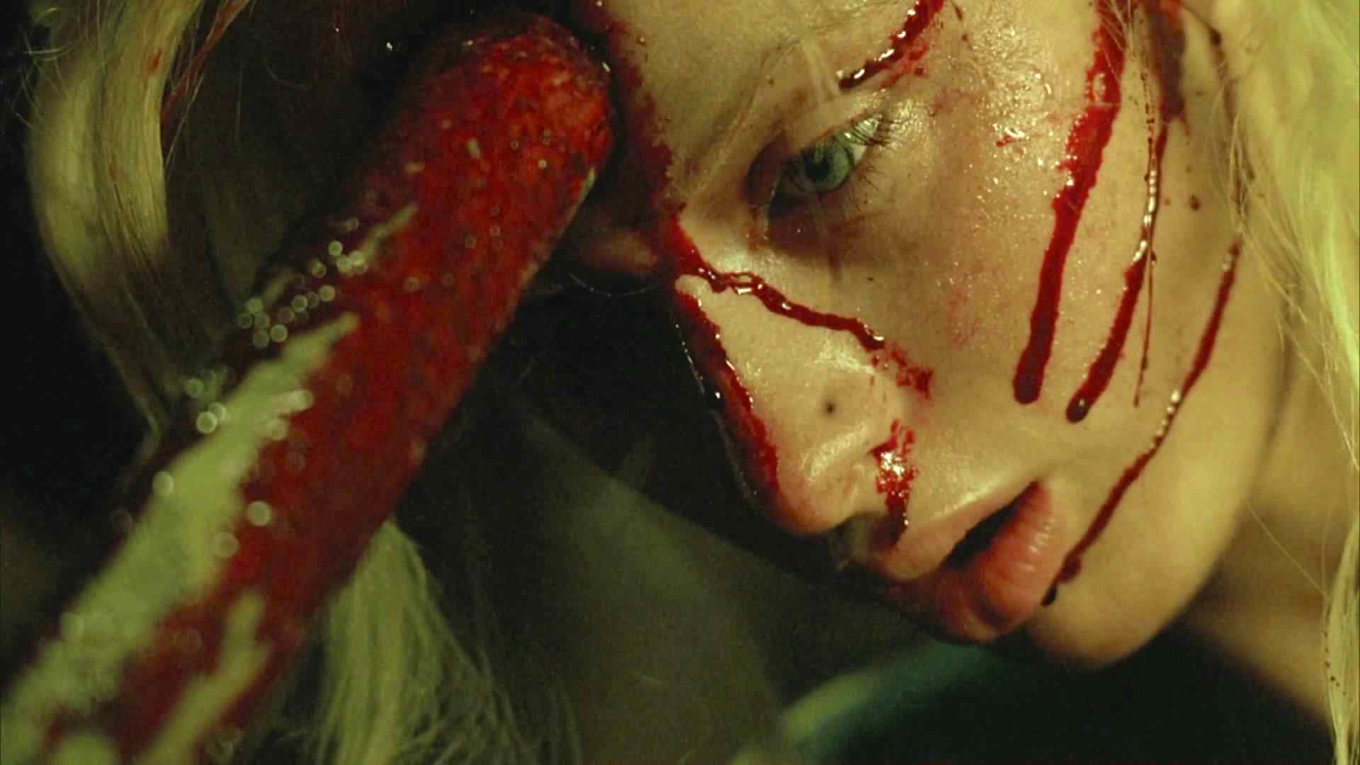 Paige ({Paris Hilton) Death scene in Jaume Collett-Serra's 2005 remake of House of Wax.