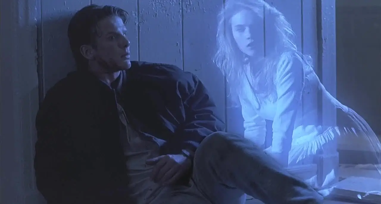 Alison (Cami Cooper) appears to Jonathan (Peter Berg) in Wes Craven's 1989 horror feature Shocker.