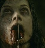 A possessed Maya (Jane Levy) slits her tongue in the remake Evil Dead 2013 - directed by Fede Alvarez.