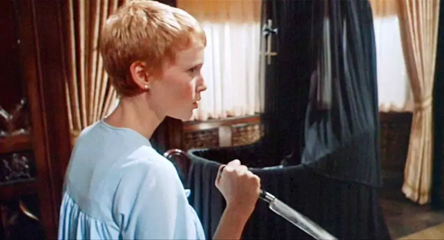 Rosemary grabs a knife in Roman Polanski's 1968 horror film Rosemary's Baby.
