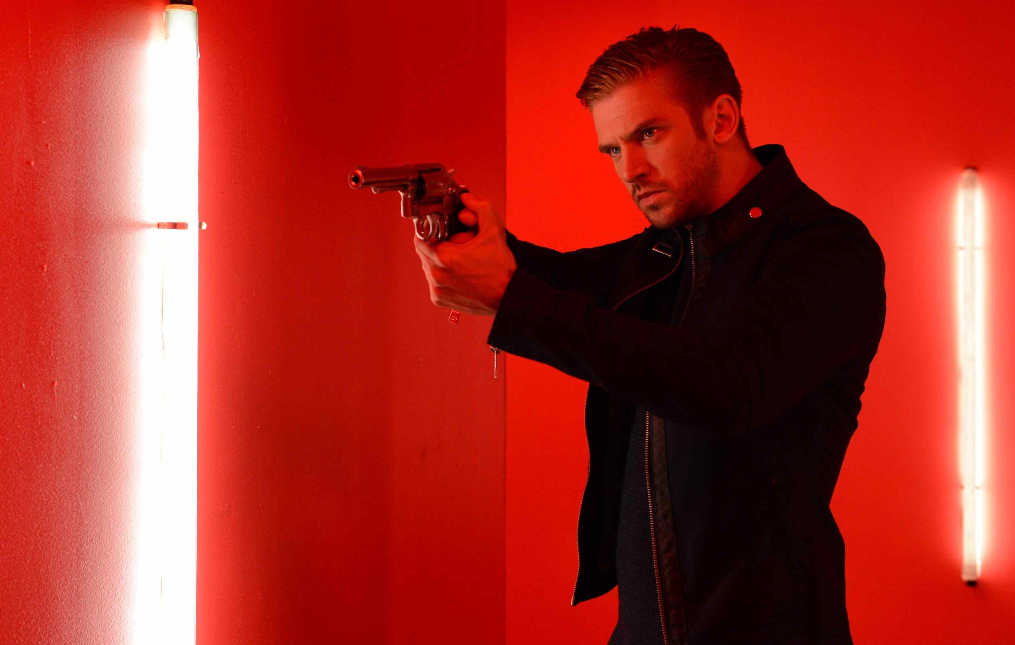 David (Dan Stevens) wields a gun in Adam Wingard's The Guest.