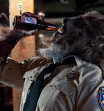 Lowell Dean. WolfCop (Leo Fafard) chugs a beer in this still from the upcoming Lowell Dean film WolfCop.