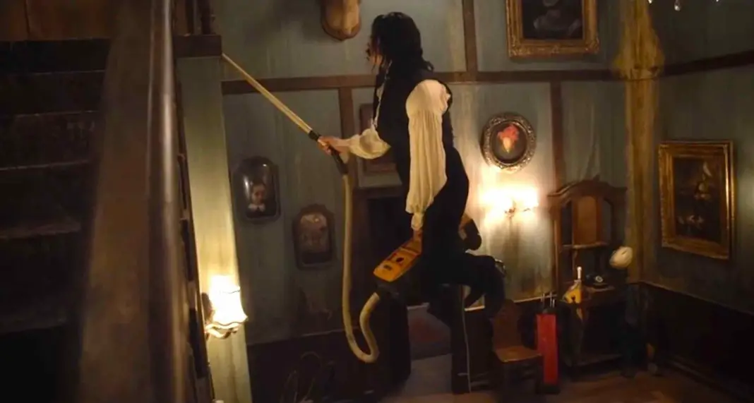 A levitating vampire getting hard to reach places whilst vacuuming in What We Do in the Shadows.