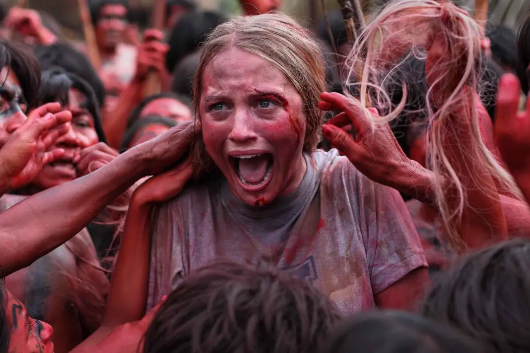 Civilization being caressed by cannibals in Eli Roth's Green Inferno.
