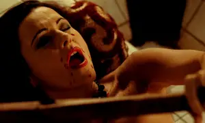 In a scene inspired by the Elizabeth Bathory legend, it is a beautiful woman who tortures and kills one of the girls.