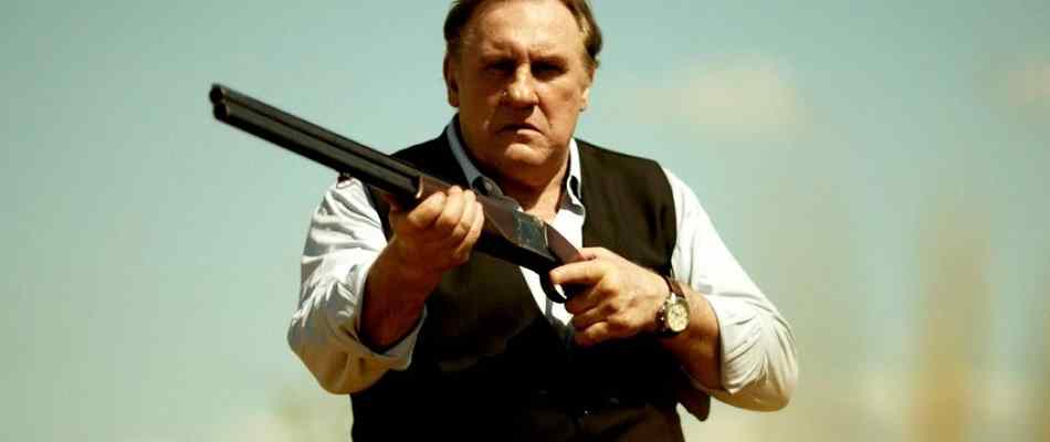 Gerard Depardieu wielding a shotgun in 2014's Viktor