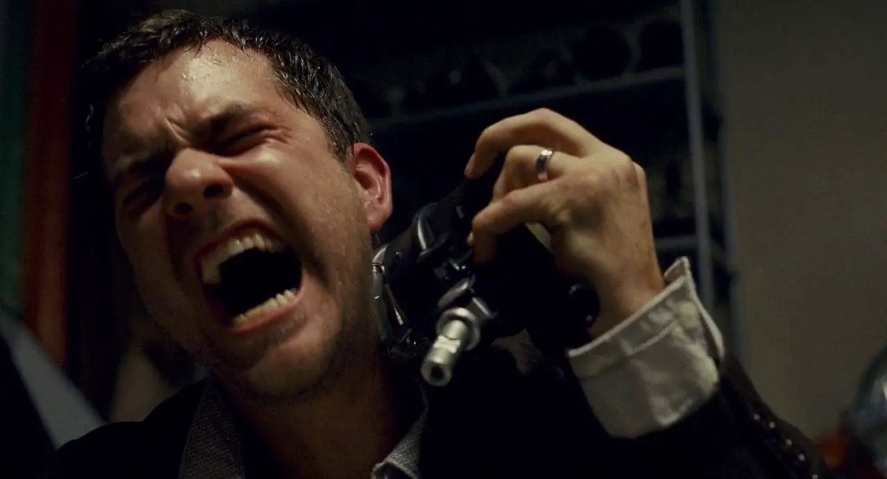 Joshua Jackson strangely decides to hurt himself with a camera light in the Shutter remake.