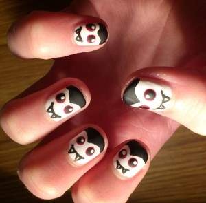 dracula fangs nail art.