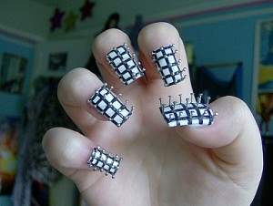 hellraiser pinhead nail art.