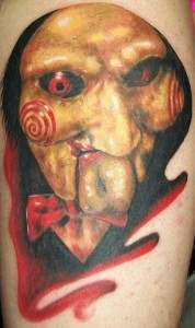 the saw movie puppet billy tattoo.