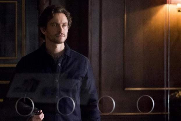 Will Graham approaches Hannibal Lecter's cell at the Baltimore State Hospital for the Criminally Insane.