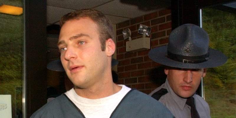 ** FILE ** Pennsylvania State police escort Hugo Selenski from his court appearance Oct. 6, 2003, in Kingston, Pa. Selenski, who had at least five sets of remains buried in his yard, was acquitted Wednesday, March 15, 2006 on several murder counts, but was convicted of abusing the corpses of two suspected drug dealers. (AP Photo/Bradley C. Bower)