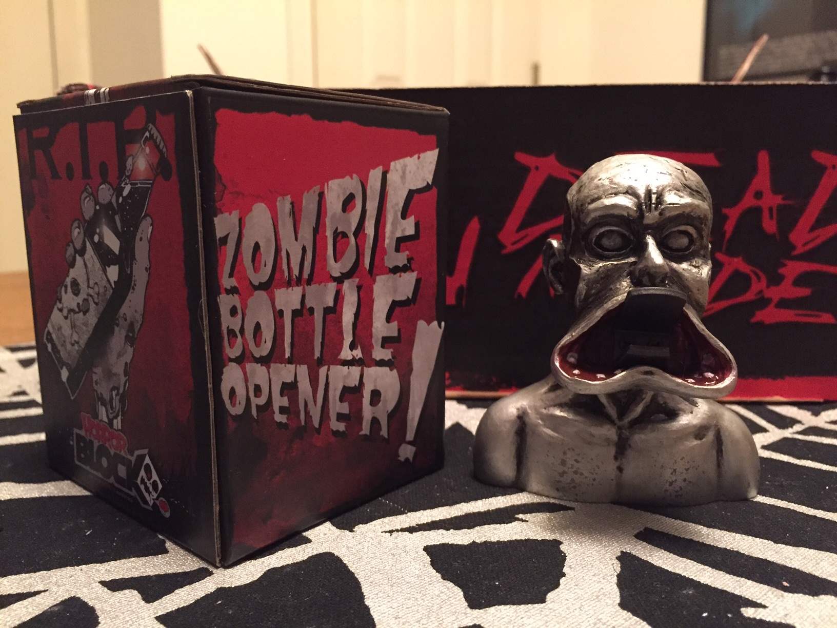 A metal zombie bottle opener in February 2016's Horror Block