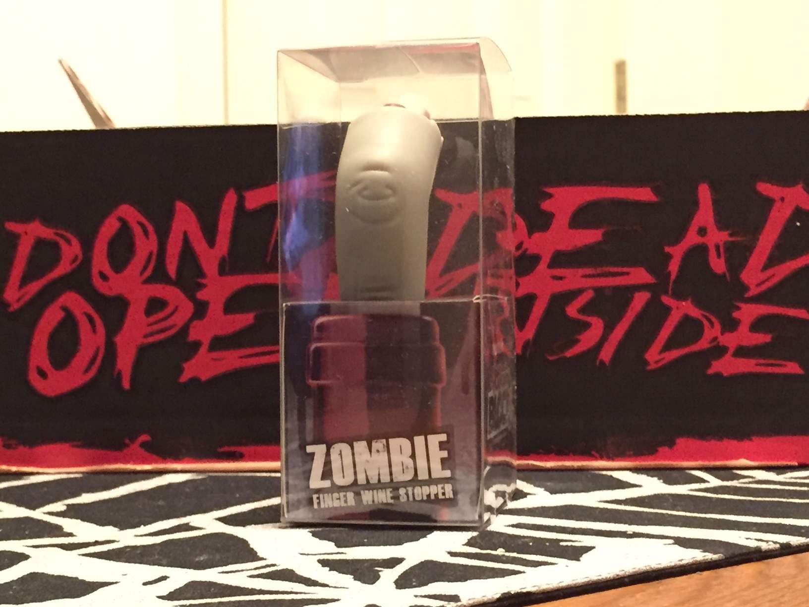 A wine stopper in the shape of a zombie finger in February 2016's Horror Block