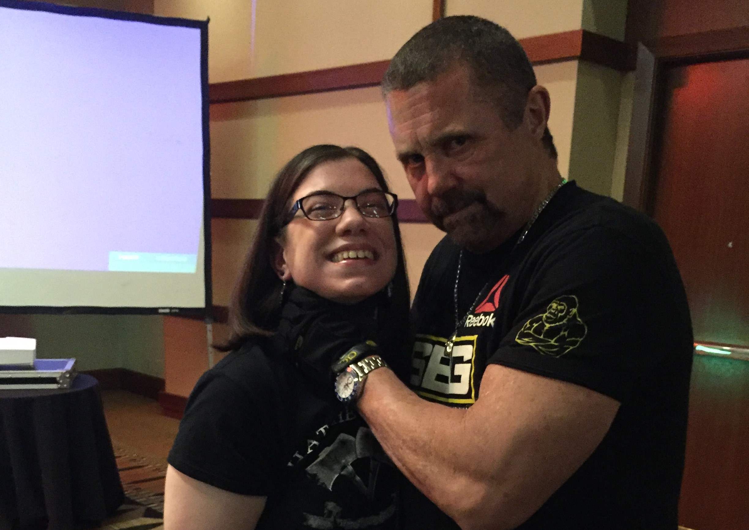 Kane Hodder puts his infamous chokehold on Michele at Texas Frightmare Weekend 2016