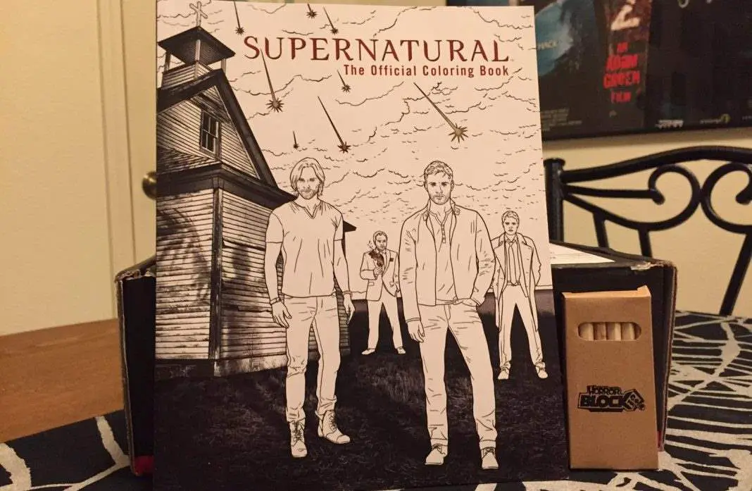 A coloring book of the TV show Supernatural, with colored pencils, in the August 2016 Horror Block