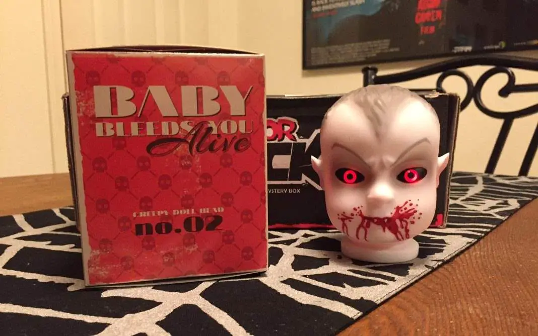 A light-up baby doll vampire head in the August 2016 Horror Block