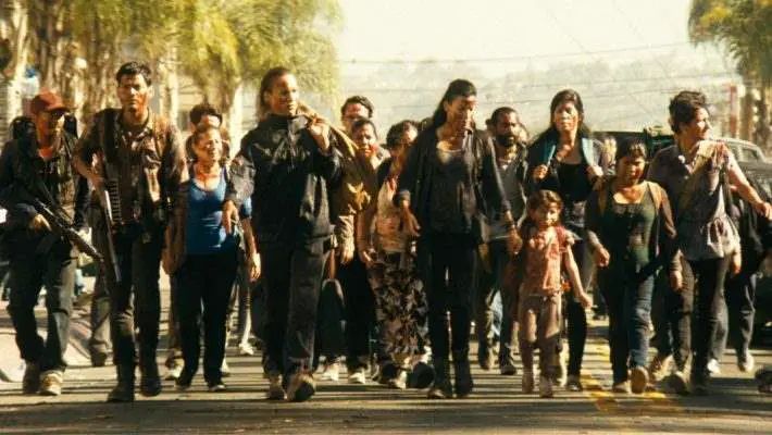 Danay Garcia as Luciana walks with several survivors in 'Fear the Walking Dead'