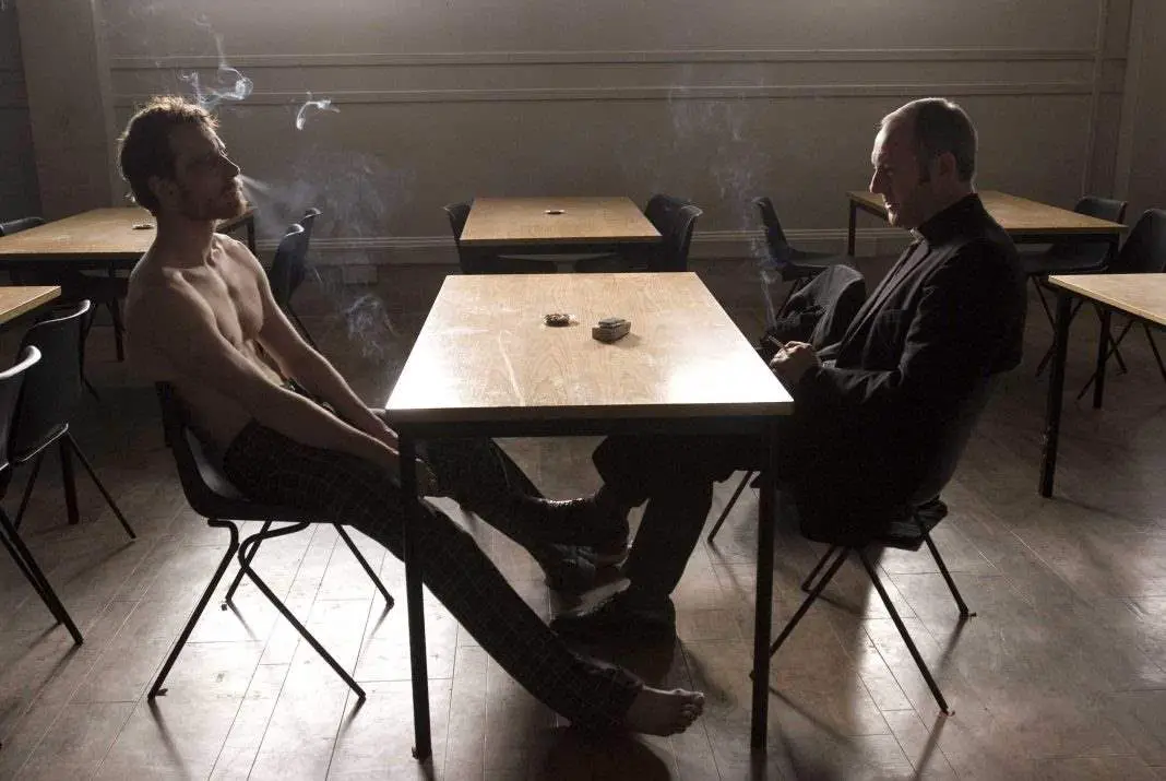 Michael Fassbender and Liam Cunningham in Hunger