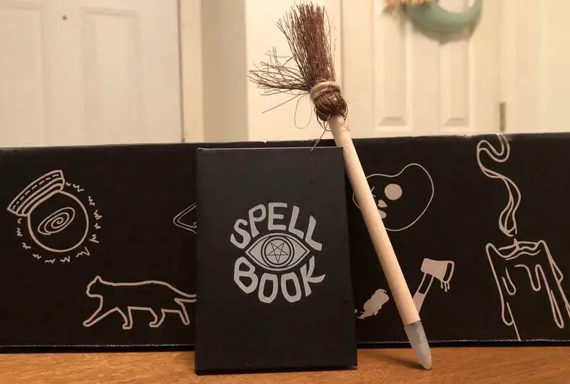 Mini spell book and broom pen in the April 2019 Creepy Crate