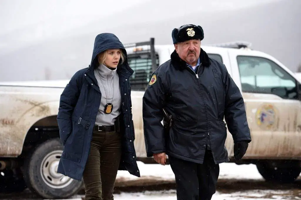 Elizabeth Olsen and Graham Greene in Wind River