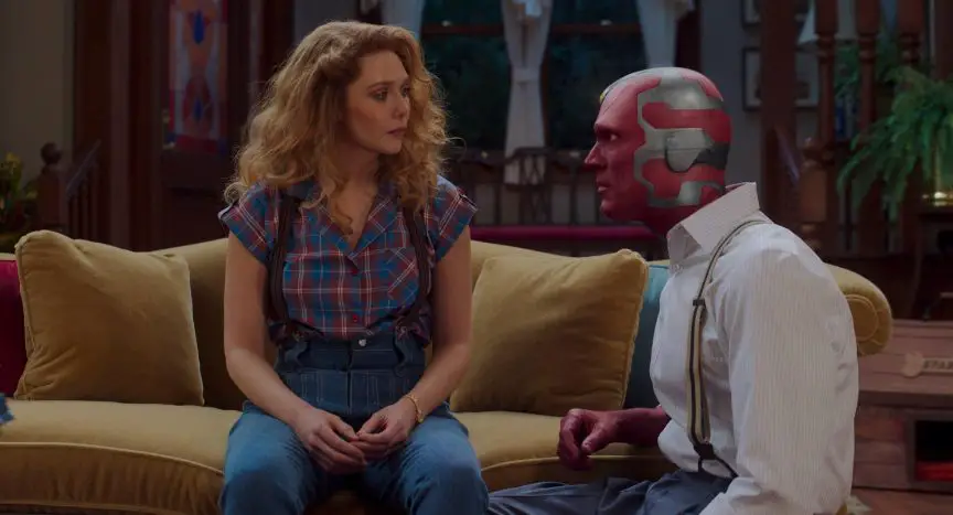 Wanda and Vision talking on the couch
