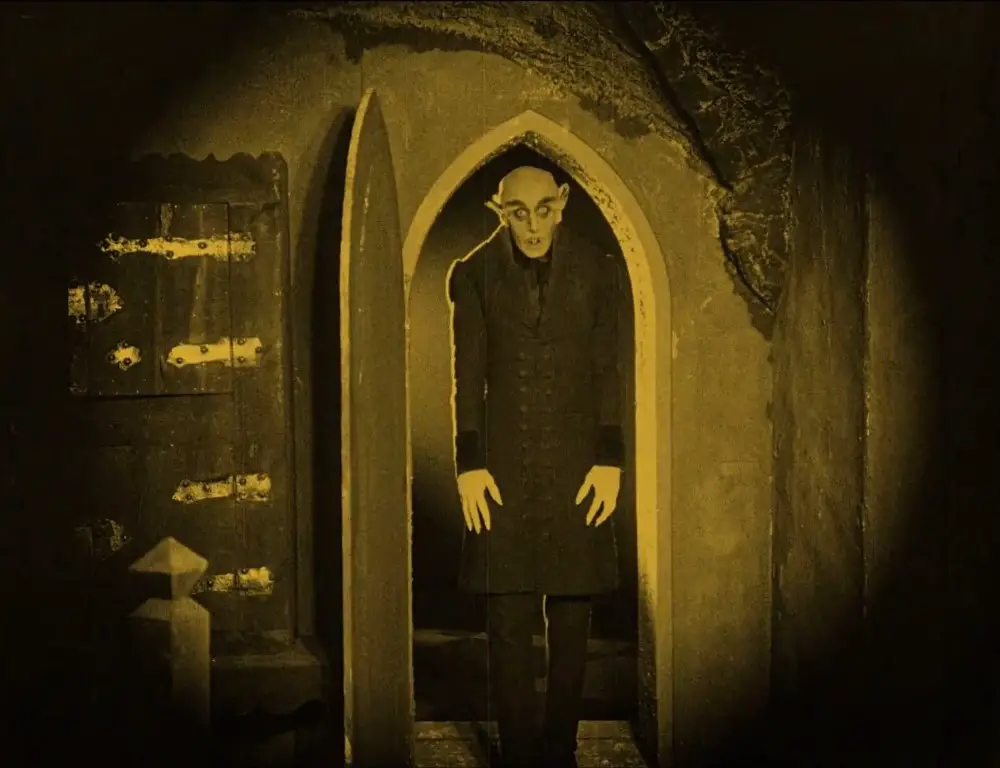 Count Orlok standing in a doorway