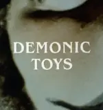 1992's Demonic Toys was written by the same guy who wrote 2008's The Dark Knight ... no really.